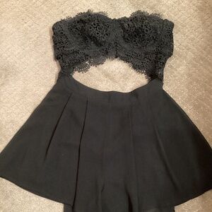 Miss Avenue black lacy strapless romper with open midriff size Large